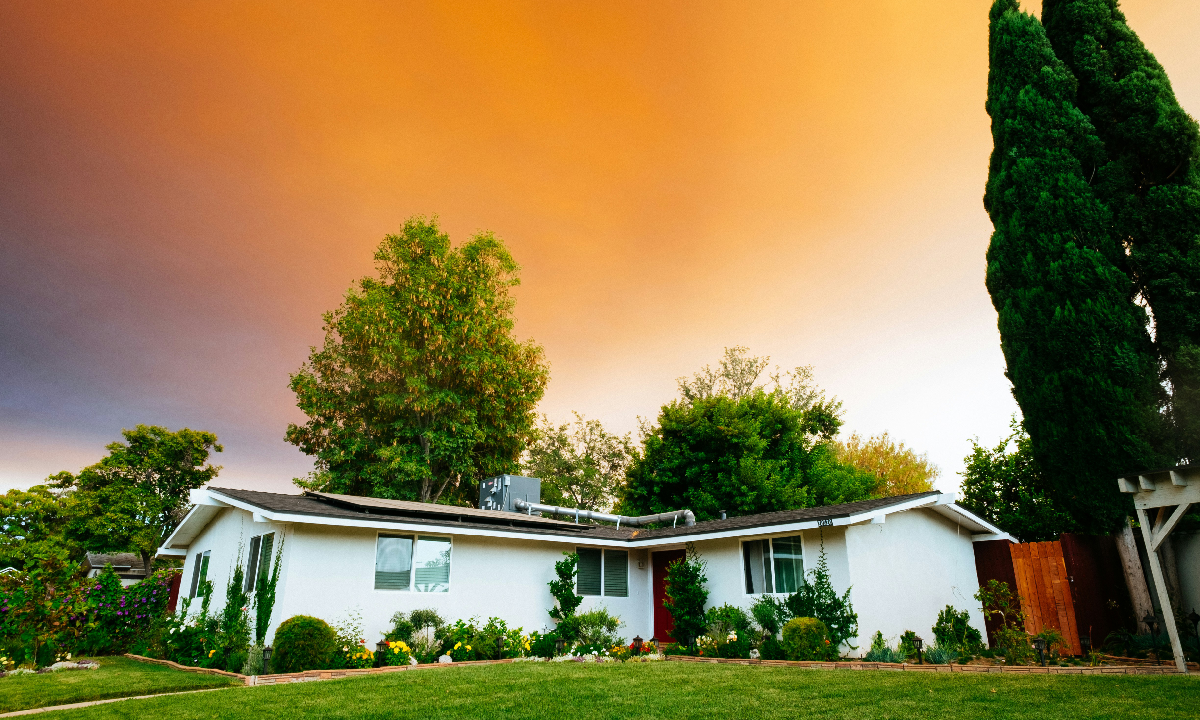 house from below with red sky