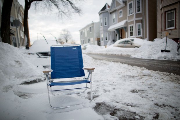 People in South Boston use random items to claim public parking spots after  winter storms 